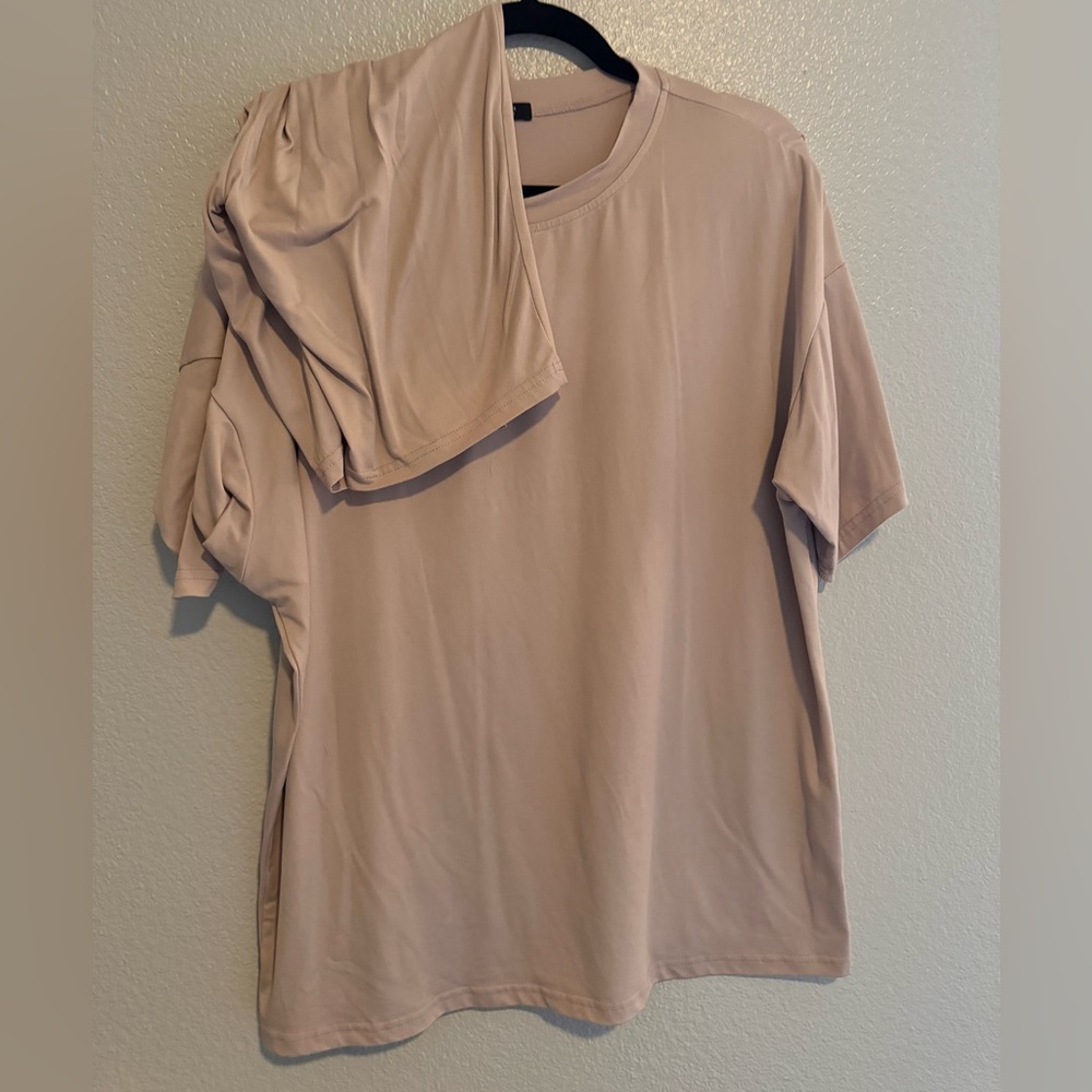 Neutral two piece set. Oversized t shirt with shorts.